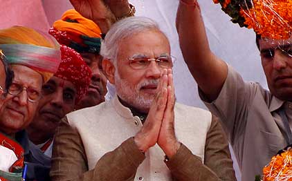 Modi congratulates his successor Anandiben Patel 